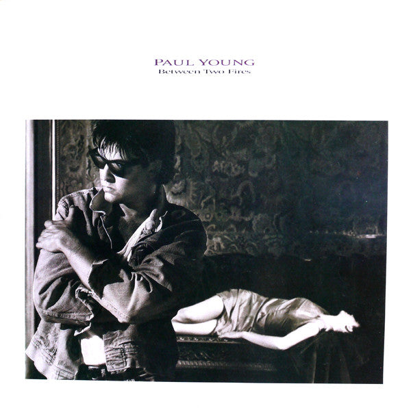 Paul Young – Between Two Fires